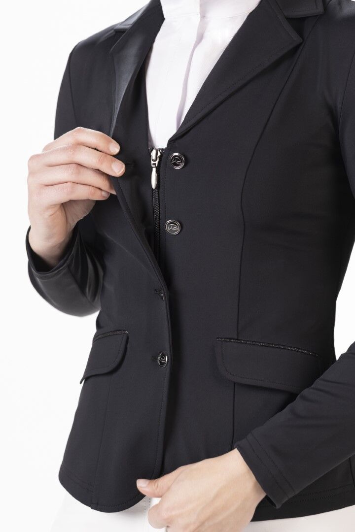 model showing equestrian show coat that has a hidden zipper behind the four buttons