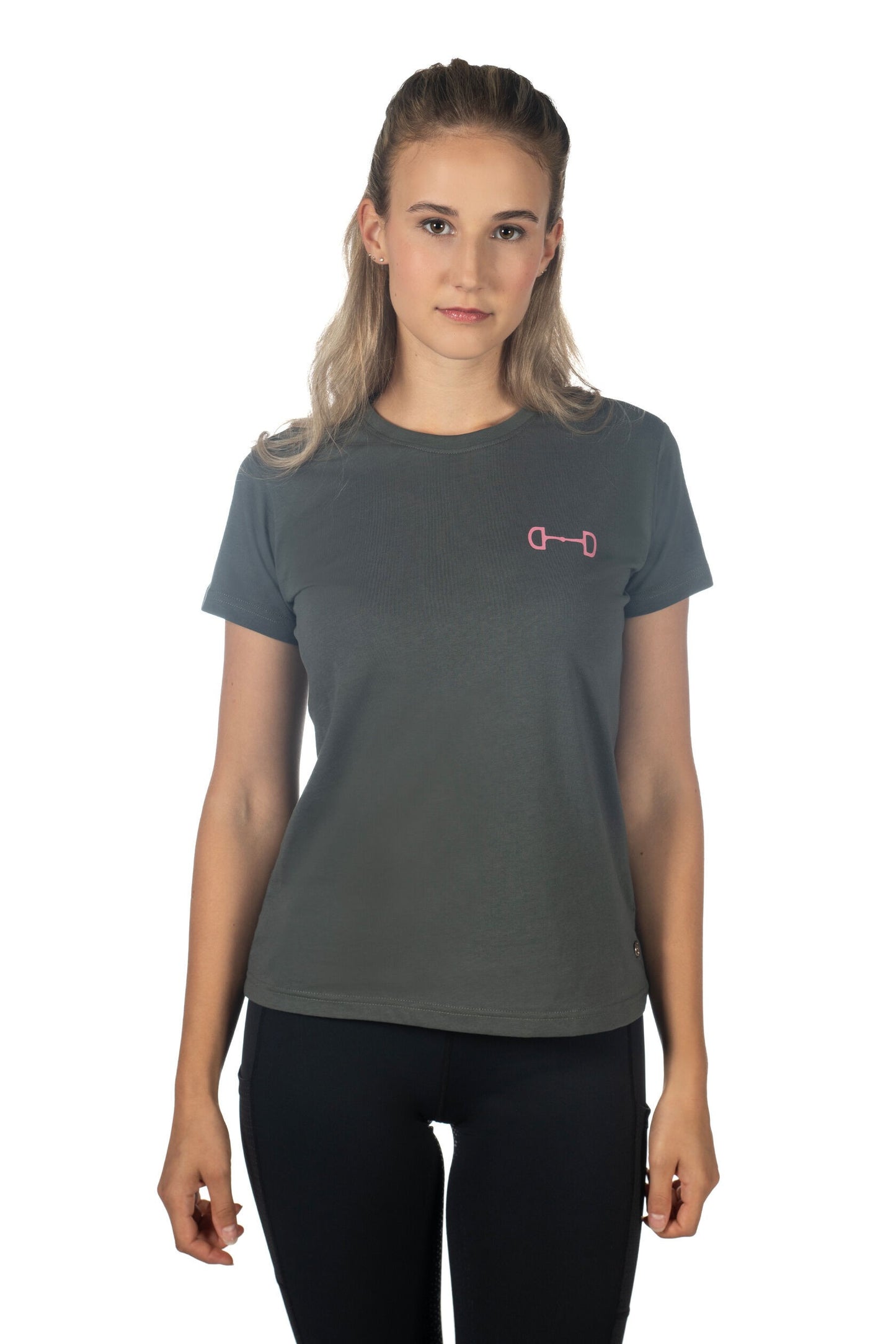 model wearing a grey/green tee shirt with a pintk snaffle bit over breast