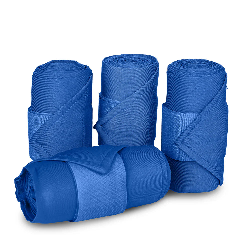 Four rolls of royal blue leg wraps on a white background