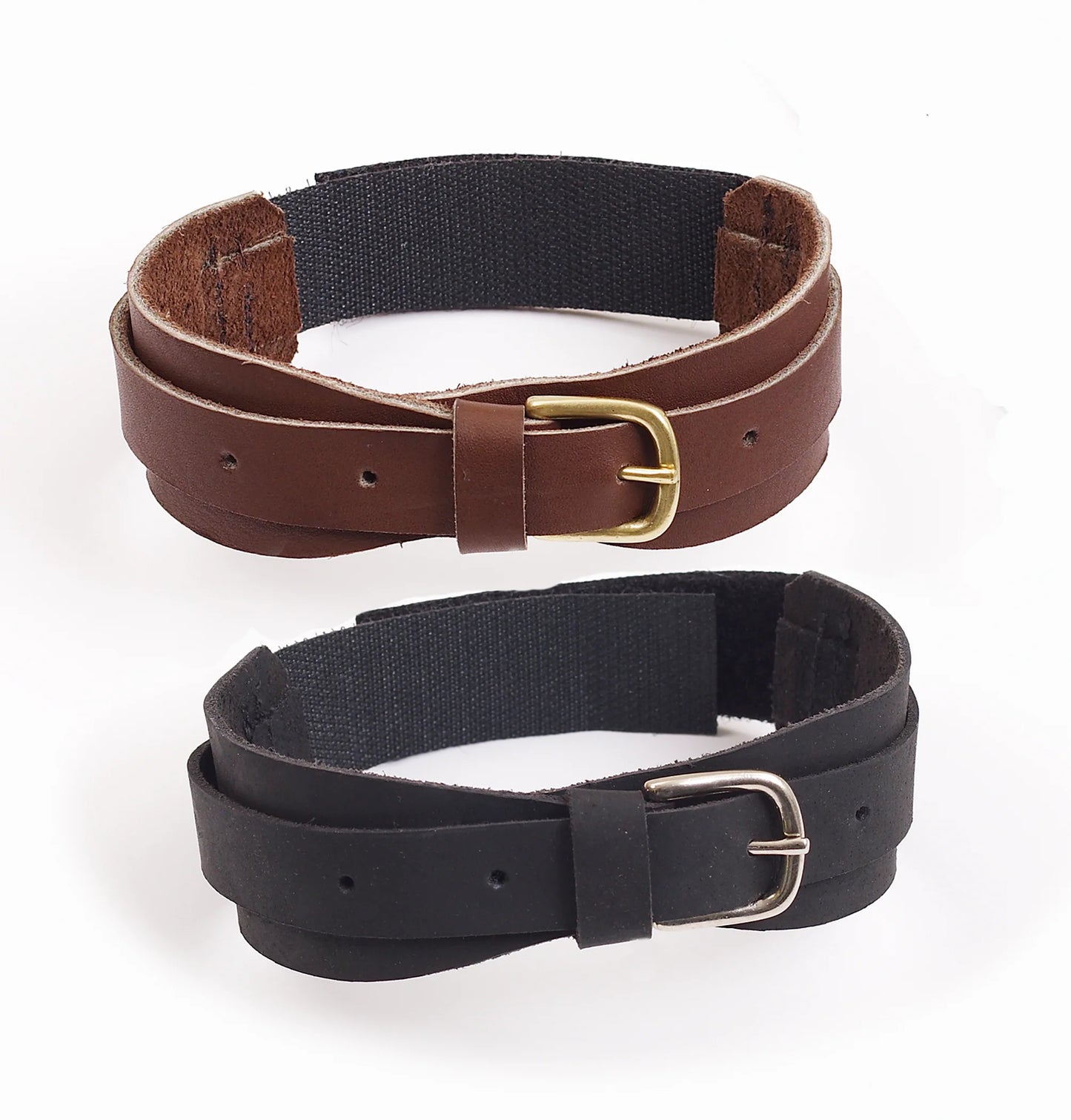 Showing one black and one brown buckle equestrian garter strap with velcro for fastening