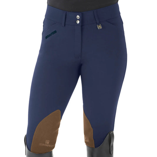 Blue riding pants with brown knee patches on a white background