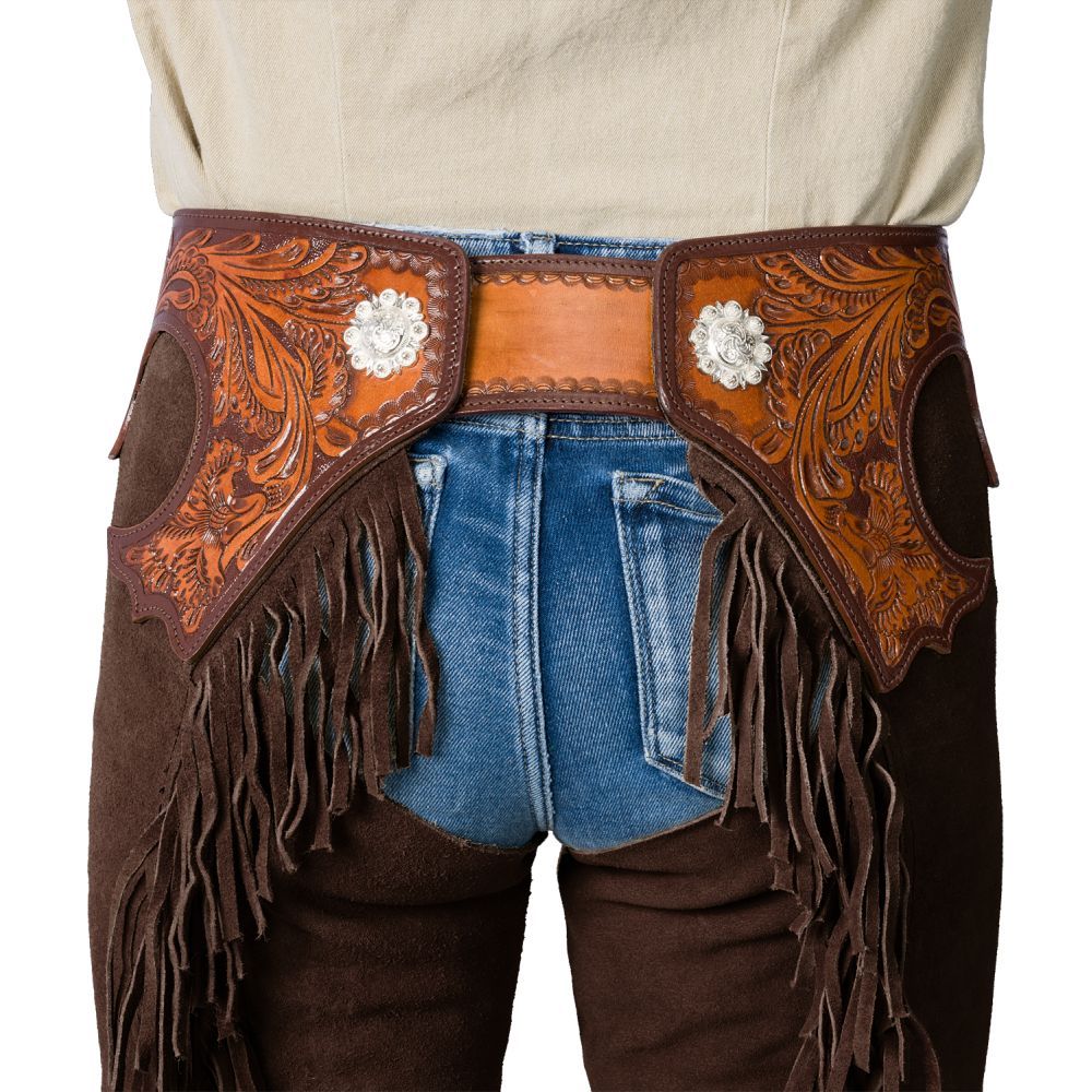 Rear view of brown full chaps with fringe and tooled leather accent
