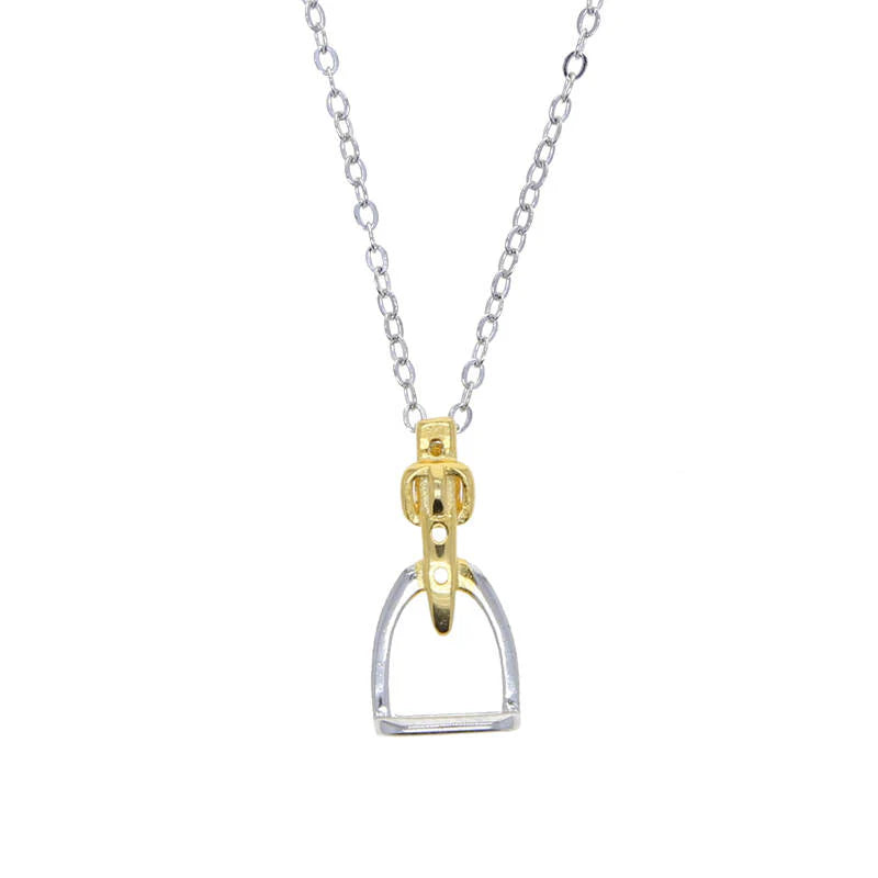 Necklace with a gold and silver stirrup pendant on a white background