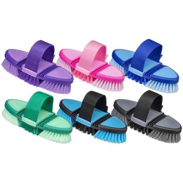 Set of colorful grooming brushes with straps on a white background