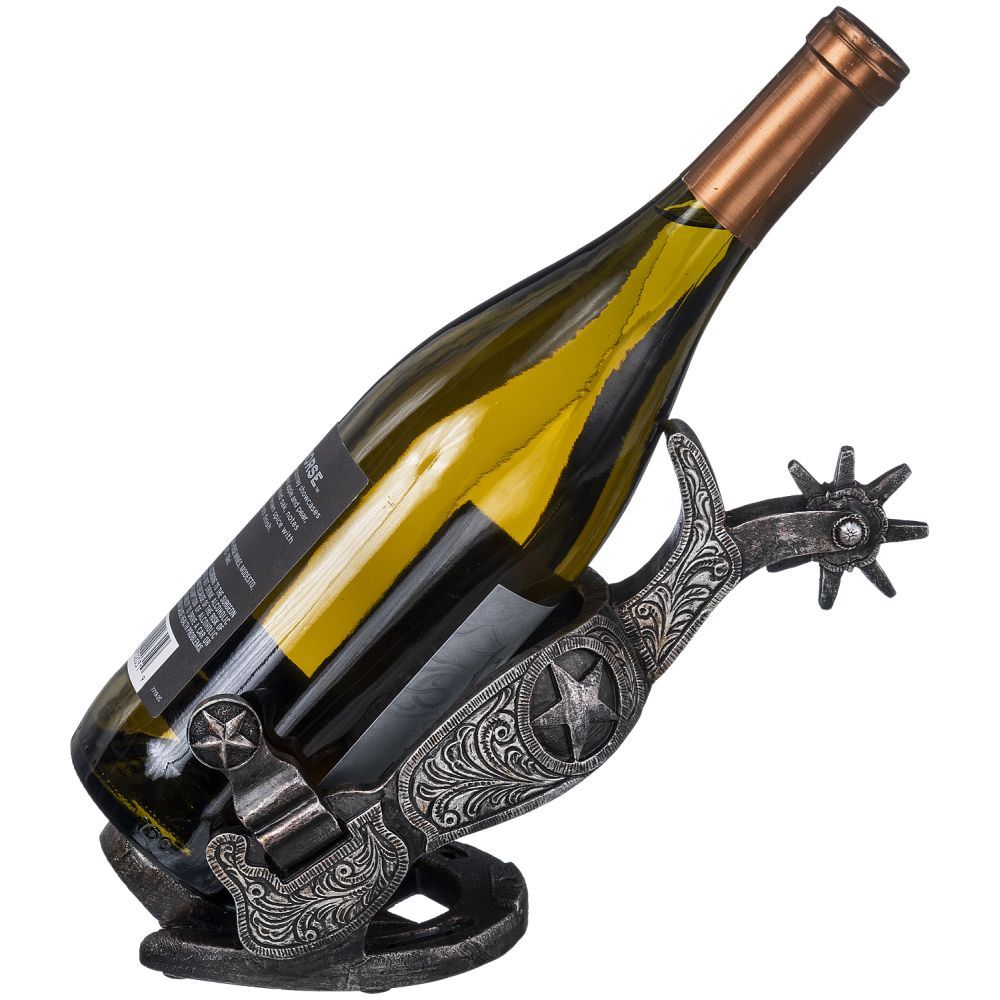 Decorative cowboy spurs holding a wine bottle