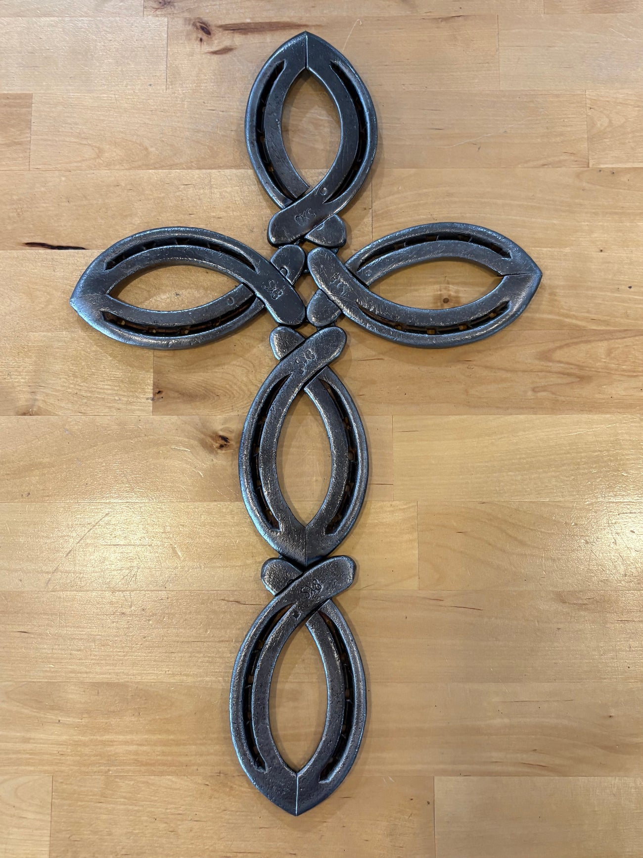 Cross made out of horseshoes