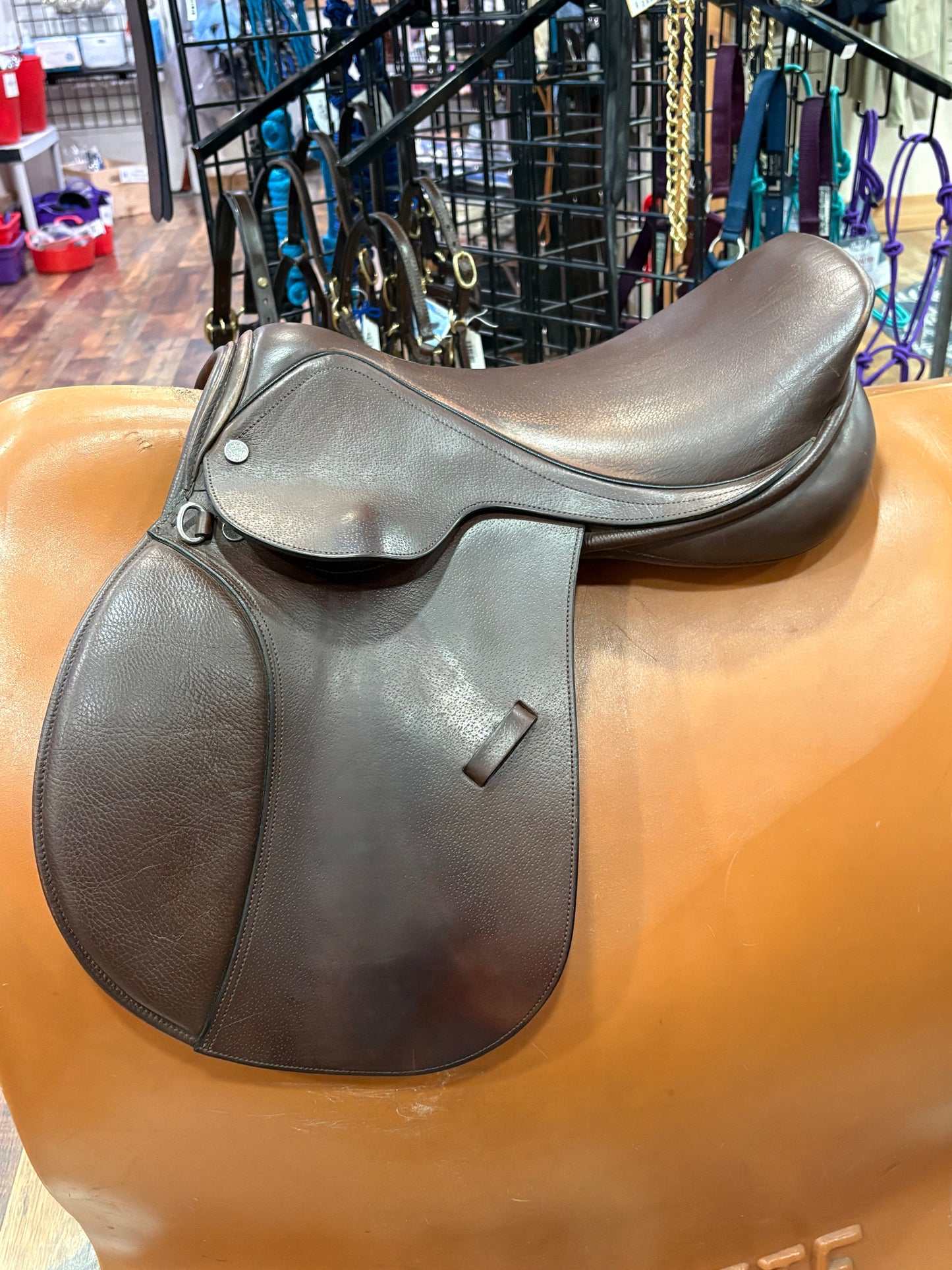 Brown leather hunt seat saddle