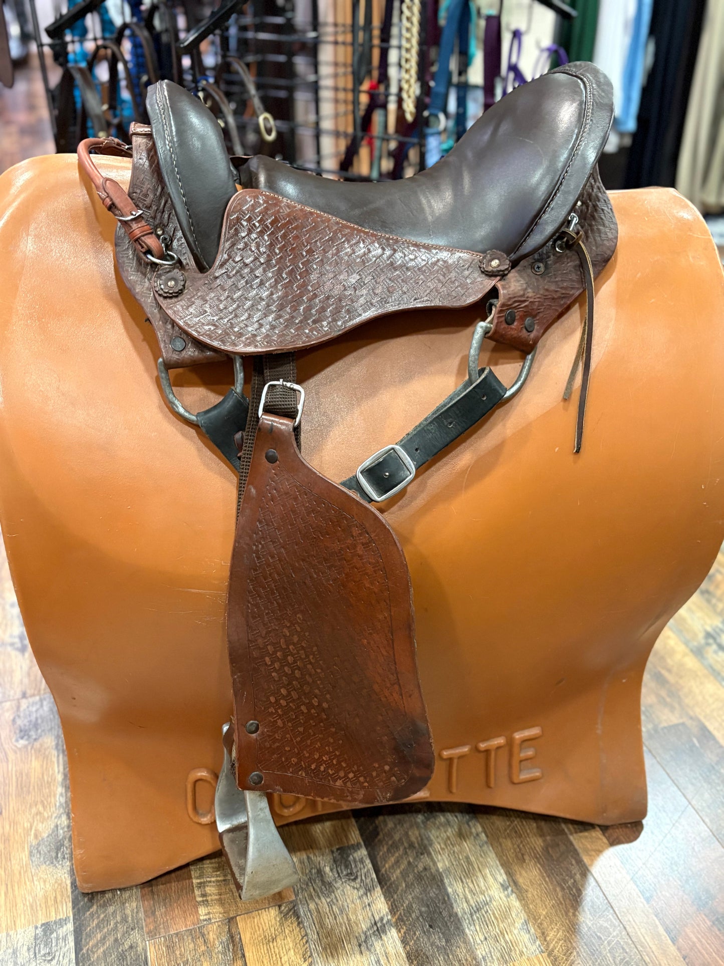 Black and brown leather trail saddle