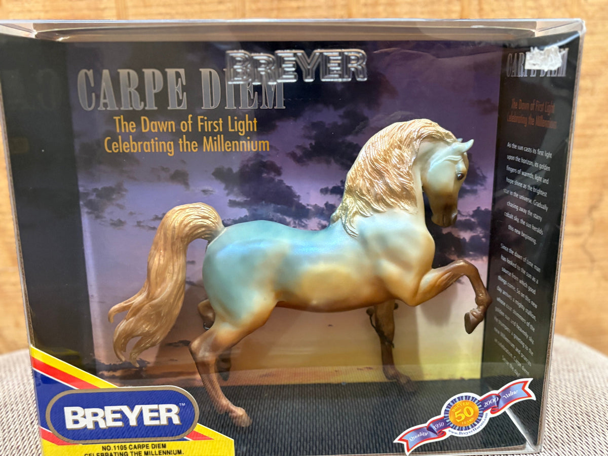 Breyer 'Carpe Diem' model horse in its original window box packaging, featuring a light blue and gold-colored horse figurine.