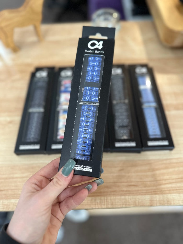 Brand C4 watch band for Apple Watch. Blue band with white bits print.