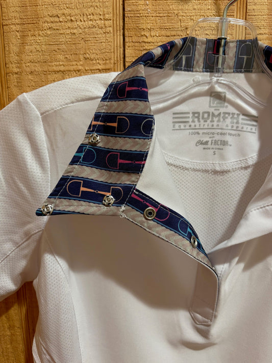 Romfh branded equestrian show shirt showing the pattern on the inside of the collar; colored bits and tan laced reins