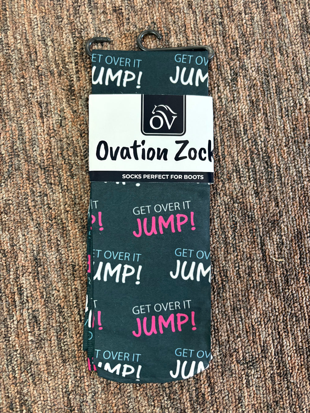 Ovation brand boot sock with a pattern of texts "Get Over It JUMP"