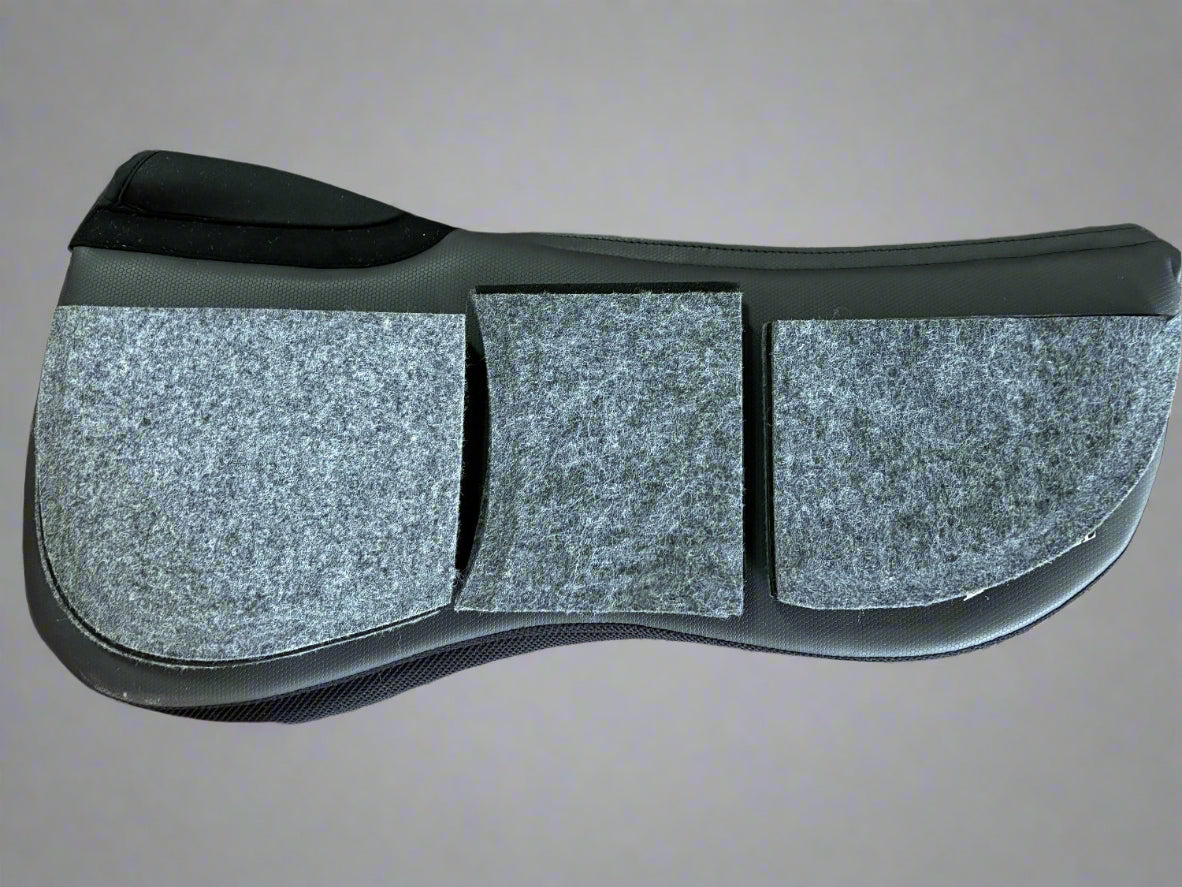 Black equestrian half pad shown with felt inserts.