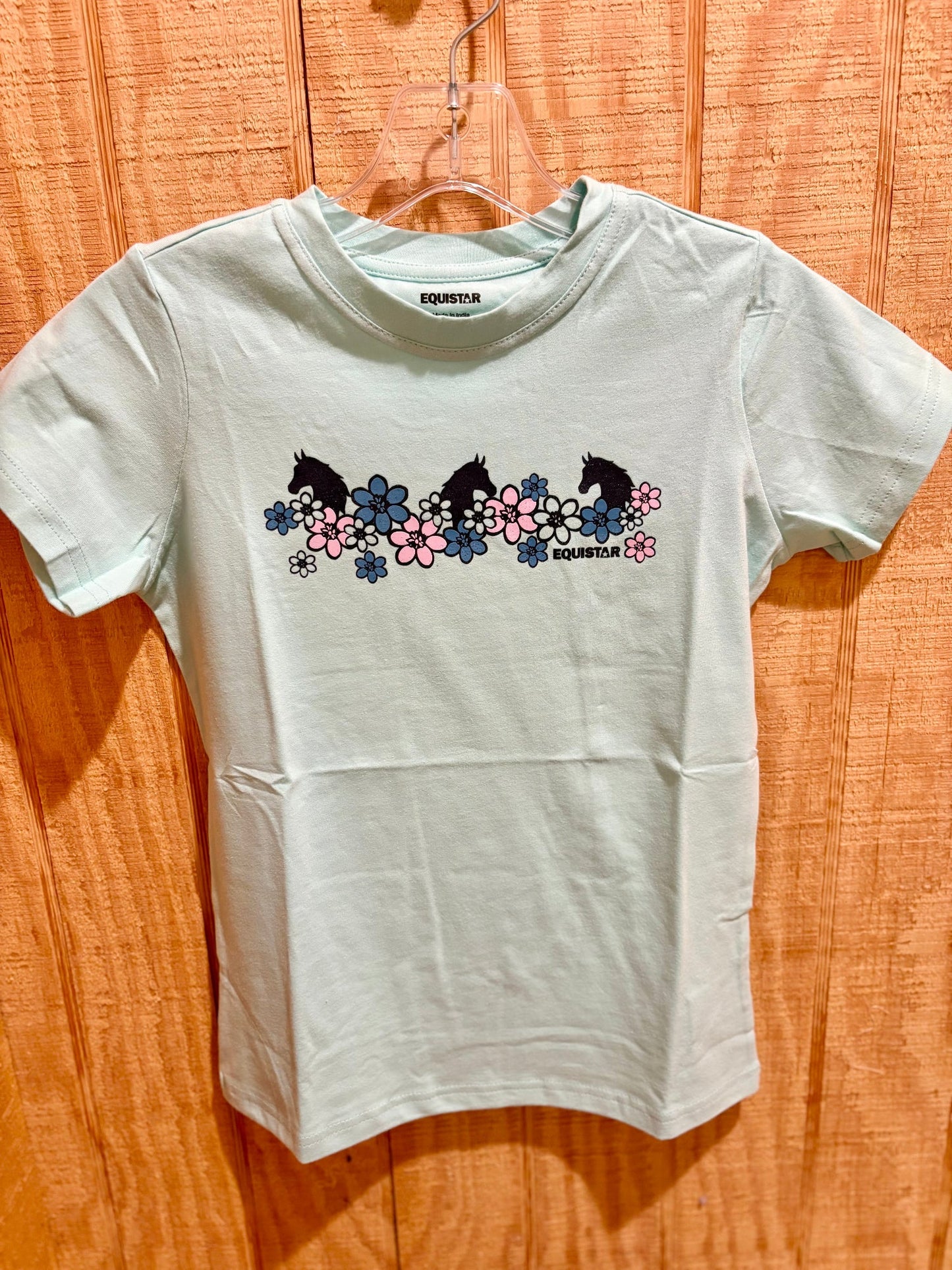 Aqua green short sleeve tee shirt with flowers and horses graphic design