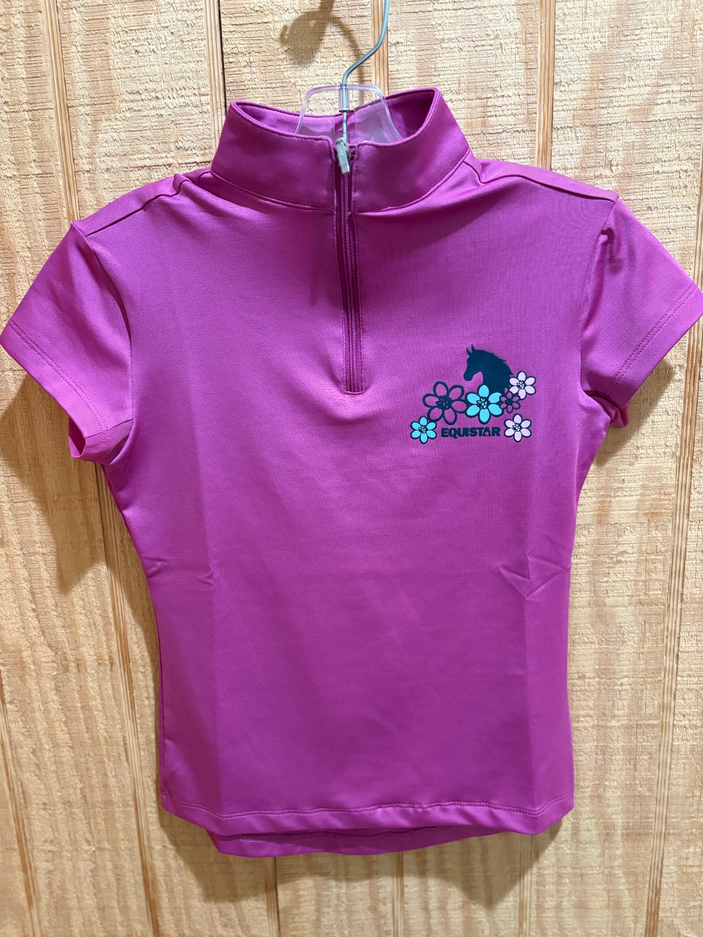 pinkish purple short sleeve quarter zip riding shirt with a horse and flowers over breast