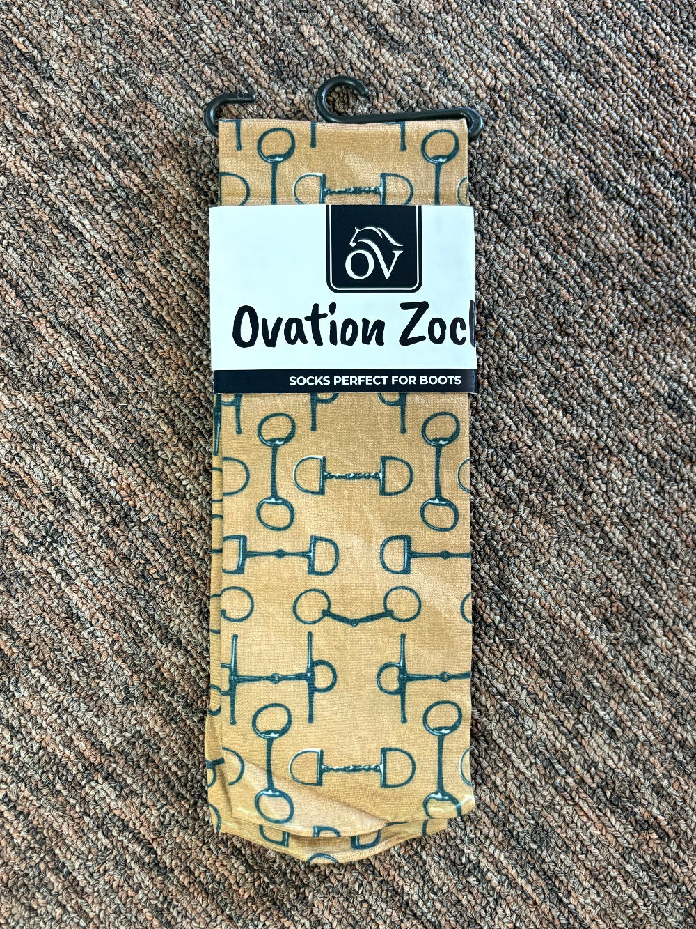 Tan socks with a print of horse bits