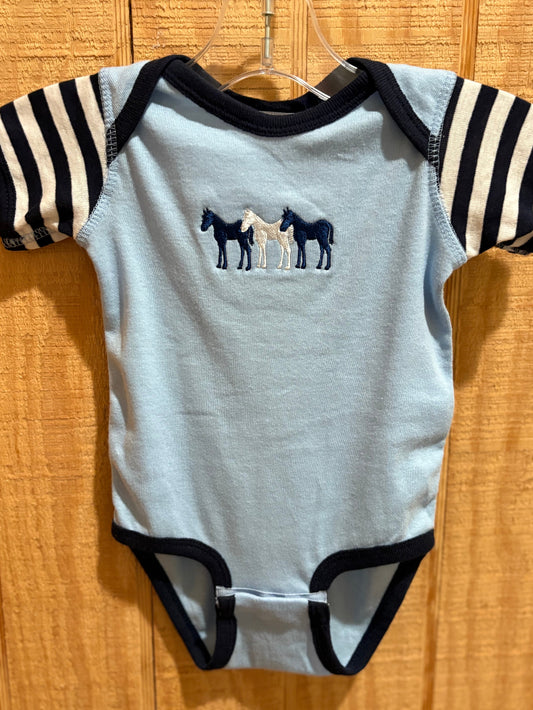 Blue baby onesie with three embroidered horses.