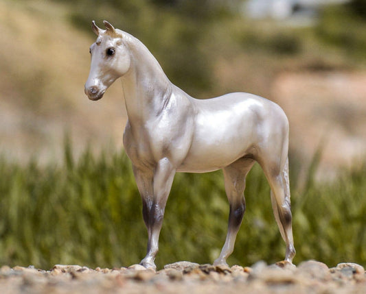 Image of a silvery colored model horse