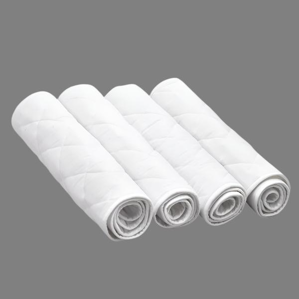 set of four rolled up white equine leg wraps
