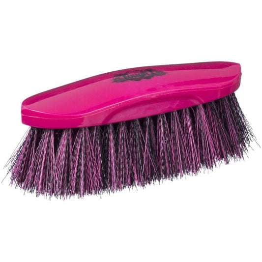 Bright pink grooming brush for horses
