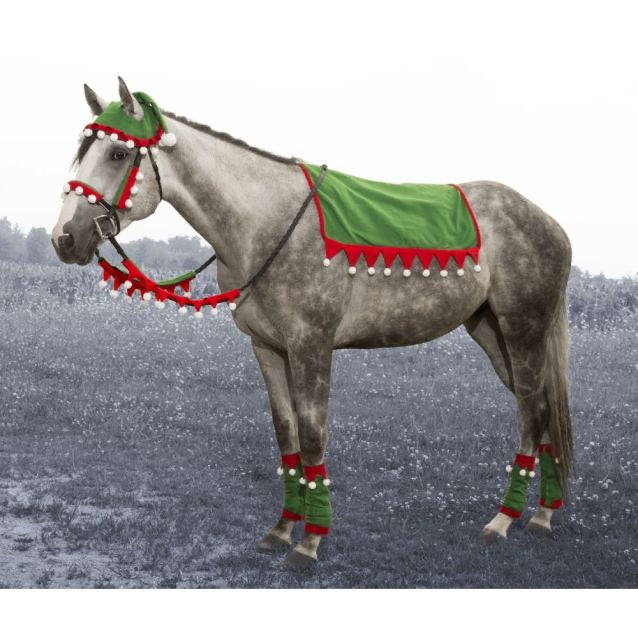 Picture of a grey horse wearing elf costume accessories - saddle pad, leg wraps, hat, bridle decorations - red and green with white poms