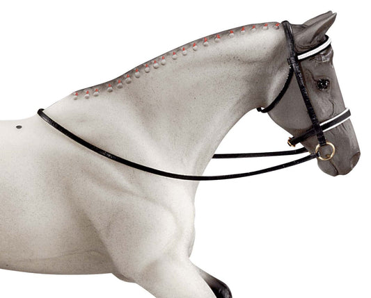 Toy horse modeling a dressage bridle with reins
