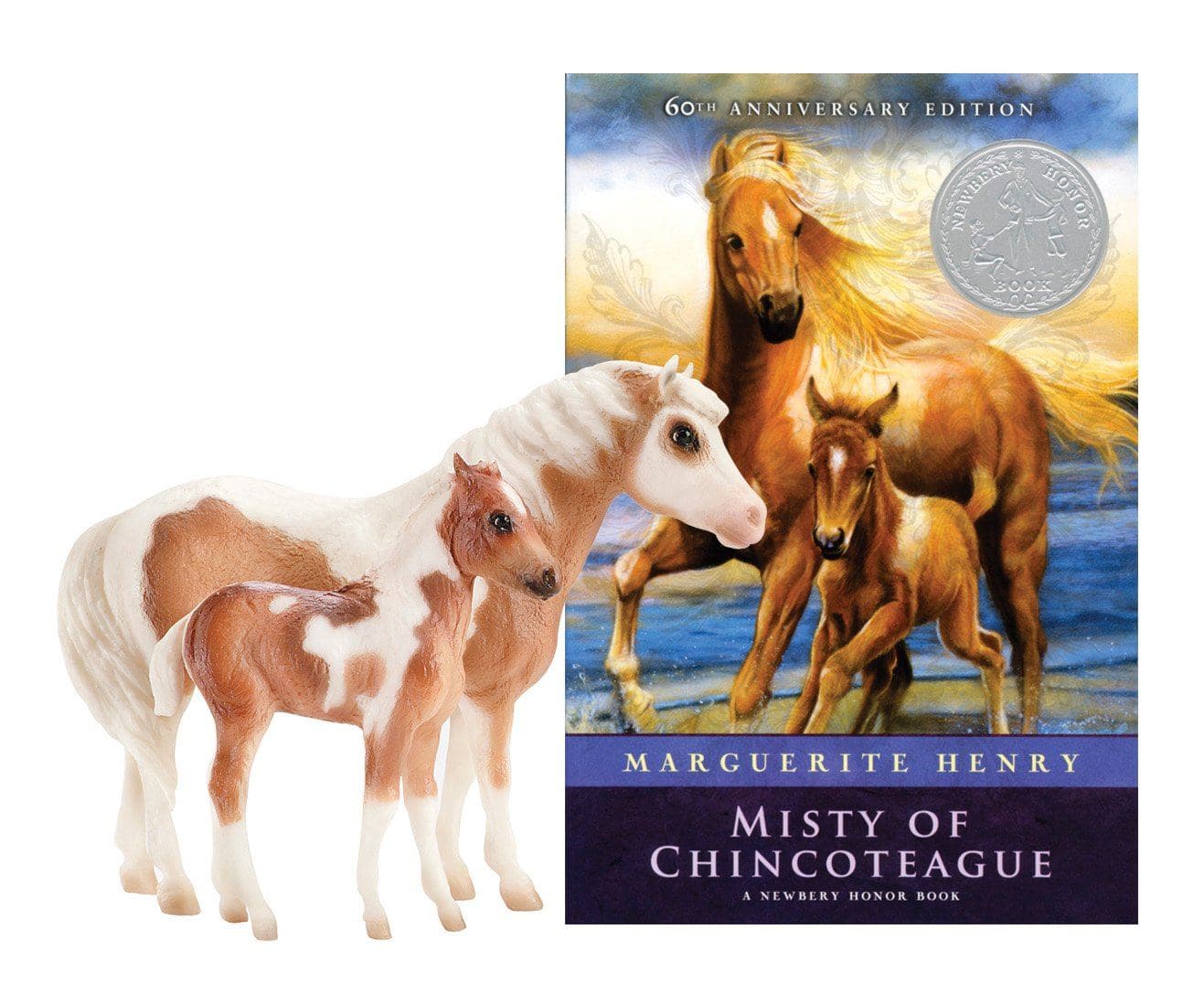 book cover for Misty of Chincoteague shown with Misty and Stormy model horses.