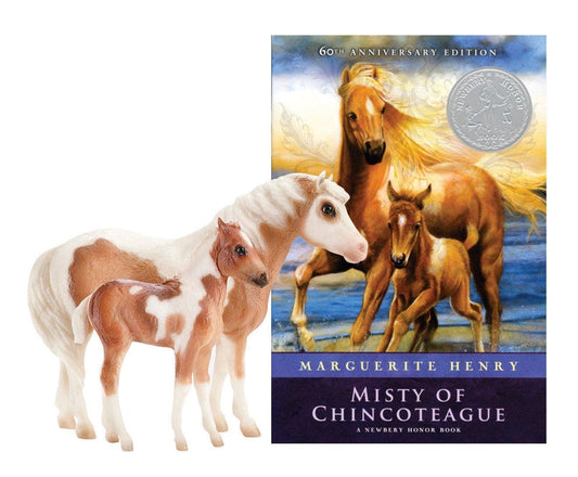 book cover for Misty of Chincoteague shown with Misty and Stormy model horses.
