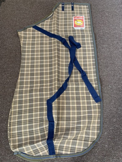 Beautiful horse blanket in traditional and classic "baker plaid" of tan and navy.