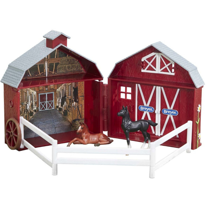 Breyer Friendships Foal Pocket Barn set. The barn has working doors and closes up to hold everything. The set includes barn, fencing, a black foal and a chestnut foal.