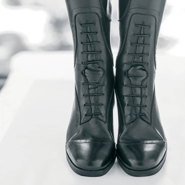 Image showing the front of a pair of black leather equestrian field boots