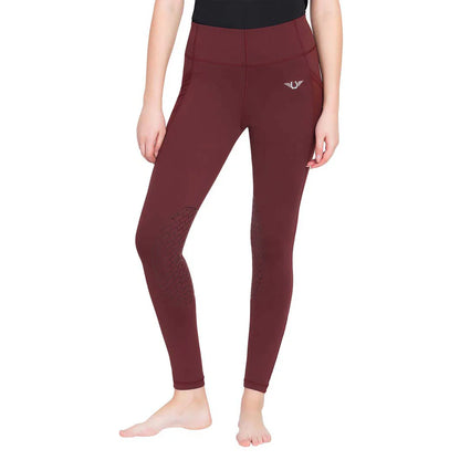 Model wearing wine colored riding tights