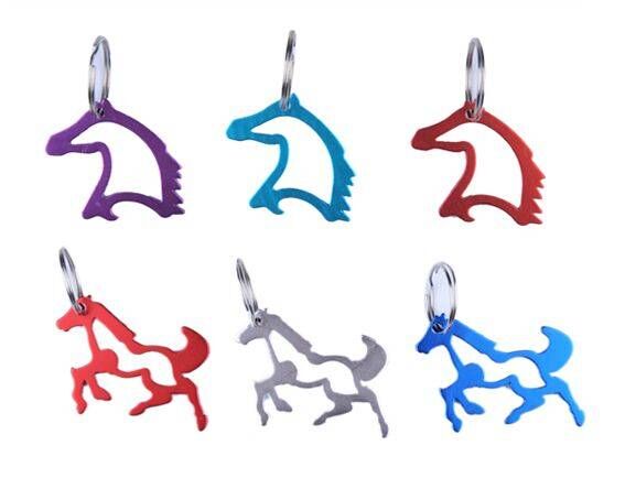 Assorted colored aluminum keychains.  Three horseheads, three prancing horses