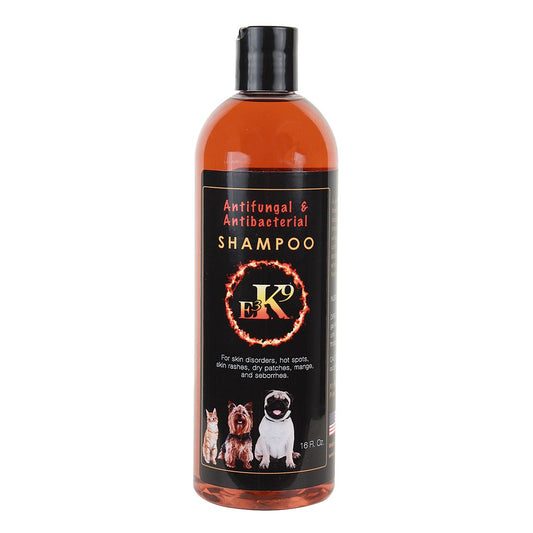 amber colored shampoo bottle with black label