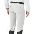 Back view of men's light colored riding breeches showing back pockets. Model is wearing a dark belt and black tall equestrian riding boots
