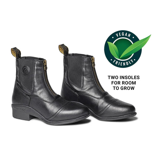 A pair of black paddock boots with front zippers and pull tabs, shown on a white background with a green 'Vegan Friendly' badge and the text 'TWO INSOLES FOR ROOM TO GROW'.