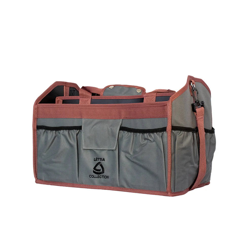 Grey and dusty rose colored grooming bag with Lettia logo on a white background.