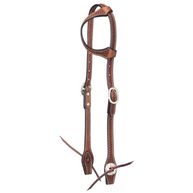 Brown leather horse bridle with decorative elements on a white background