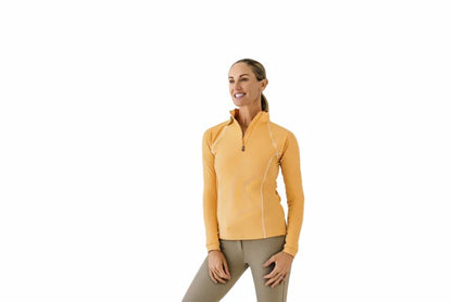 Woman wearing a safron shirt on a white background