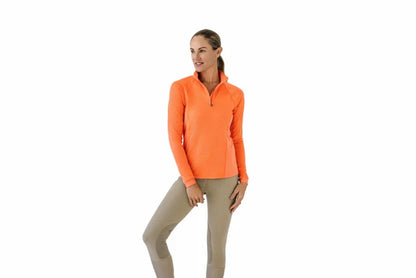 Woman wearing an orange long sleeve riding shirt on a white background