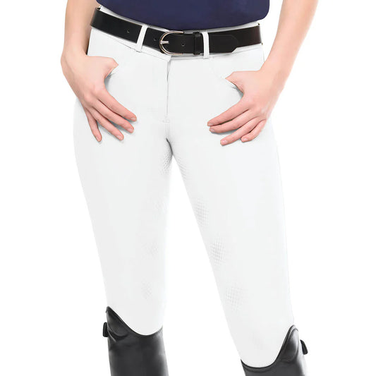 White riding pants with a black belt and black boots on a white background
