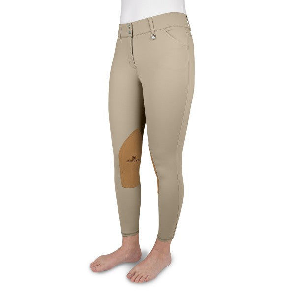 Below the waist photo of tan riding breeches with contrasting (darker) suede knee patch