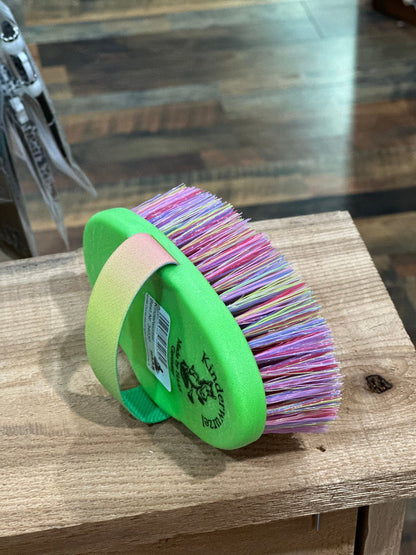 lime green hand held grooming brush with medium length, multi colored bristles