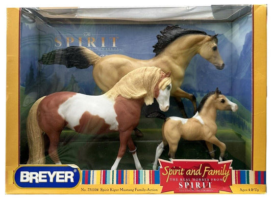 Breyer Spirit and Family 3-in-1 horse action figure set in its original window box packaging, featuring a tan horse, a brown and white pinto horse, and a small tan foal against a scenic backdrop.