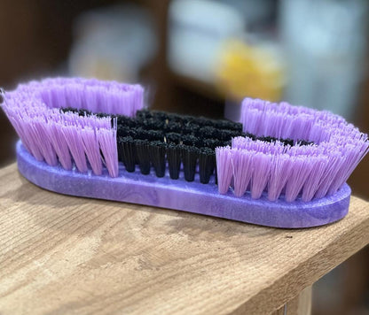 hand held grooming brush with different lengths of bristles - purple/black