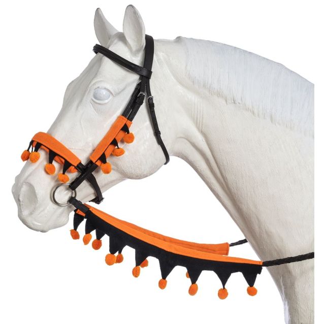White horse wearing a bridle with reins decorated with black and orange with pom-pom details on a white background