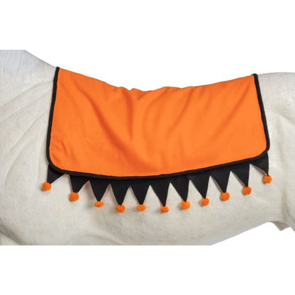 Orange saddle pad with black trim and orange pom-poms on a white horse.
