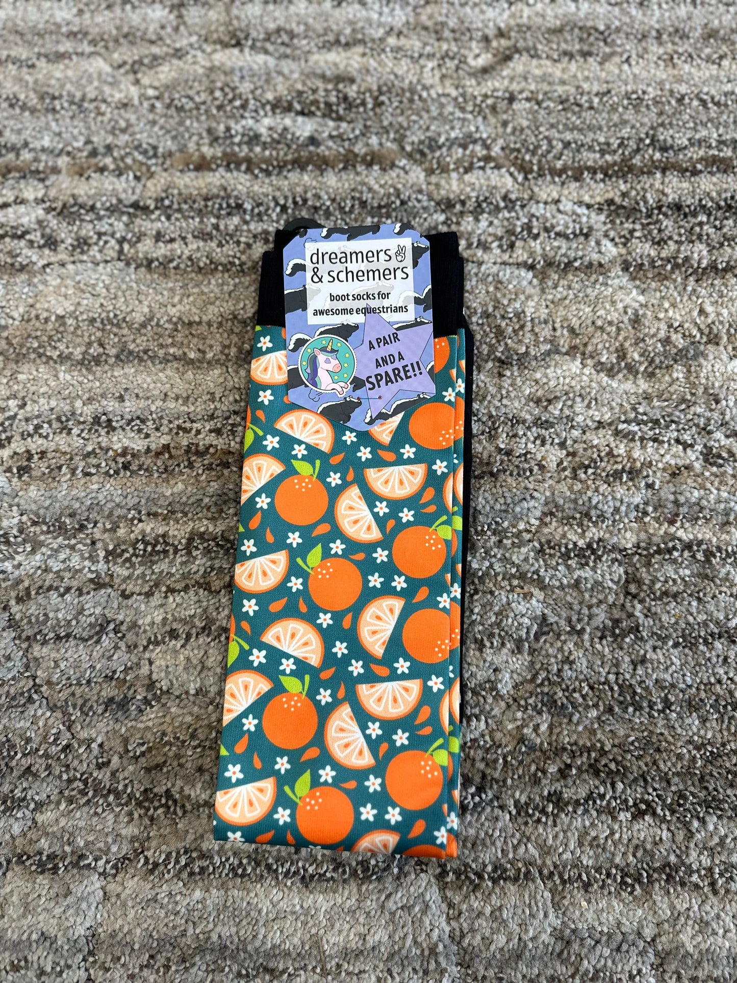 Blue riding socks with orange slice patterned design