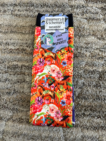 Orange riding socks with brightly colored horse and flower design