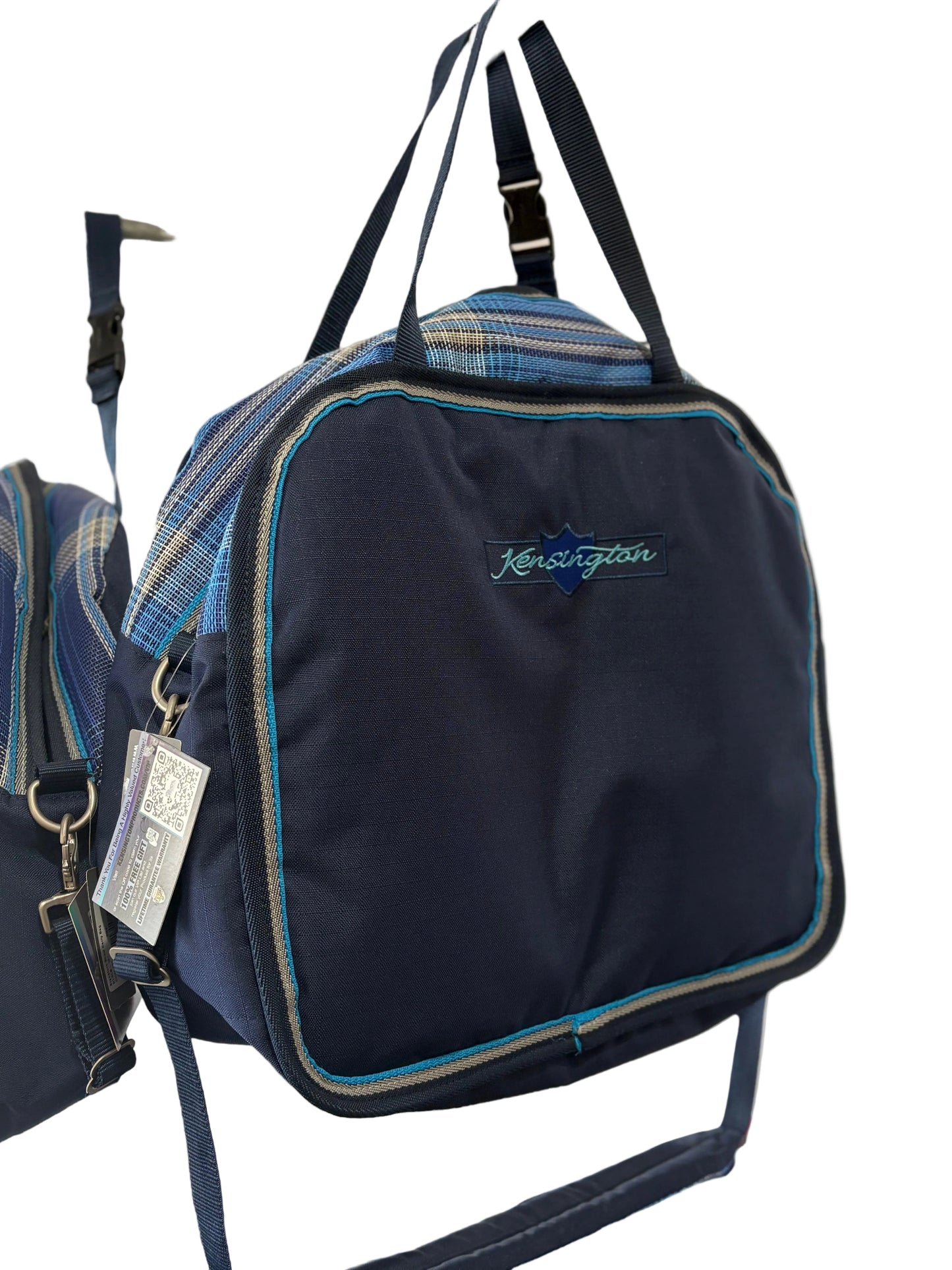 Black Kensington branded luggage with blue plaid accents.